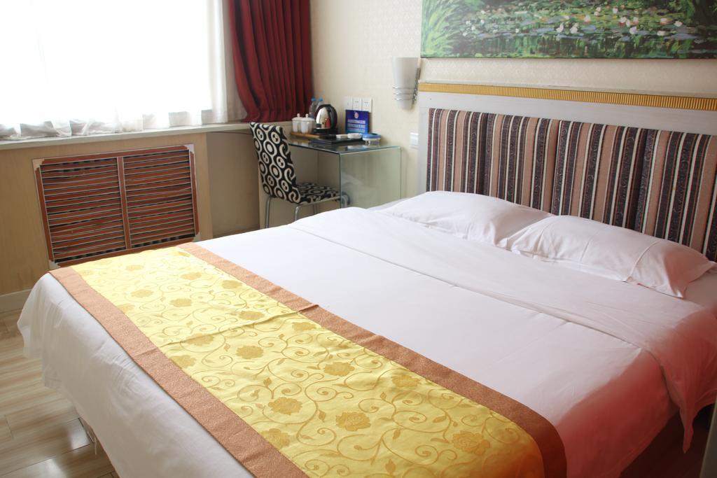 Super 8 Hotel Beijing Shijingshan Jiujiuyuan Rum bild