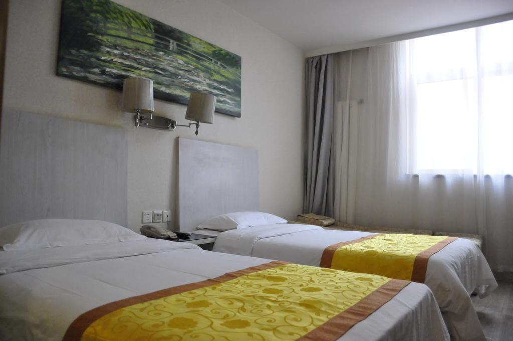 Super 8 Hotel Beijing Shijingshan Jiujiuyuan Rum bild